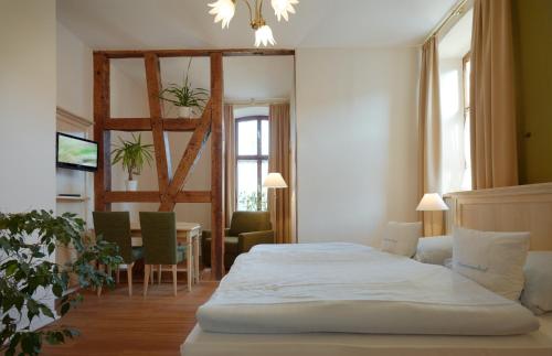 Un pat sau paturi într-o cameră la Pension Martinerhof