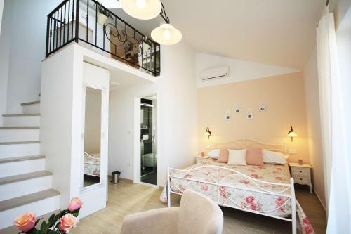 Posteľ alebo postele v izbe v ubytovaní Apartments Tomaš