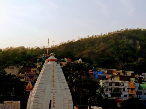 a view of a building on top of a city at La Casa in Haridwār