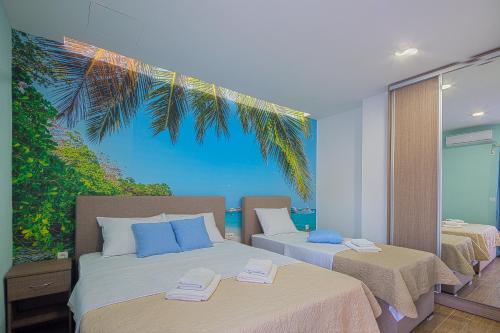 Postel nebo postele na pokoji v ubytování Apartmani Mihailovic