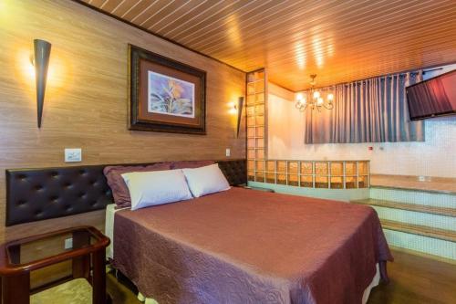 Cama ou camas em um quarto em La Dolce Vita Park Hotel - Próximo a Curitiba