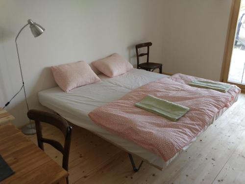 A bed or beds in a room at Kůlna