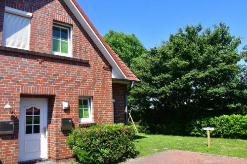 Photo de la galerie de l'établissement Ferienhaus Carolinenwind, à Carolinensiel