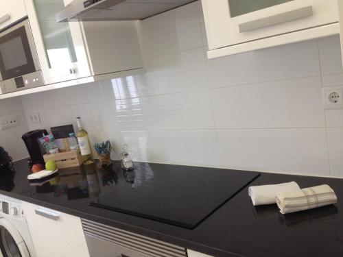 Kuchyň nebo kuchyňský kout v ubytování Cândido Reis Apartments