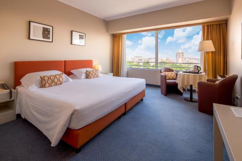 Posteľ alebo postele v izbe v ubytovaní Hotel Blaise & Francis
