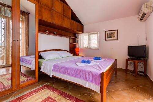 Ένα ή περισσότερα κρεβάτια σε δωμάτιο στο Sea Line Apartments