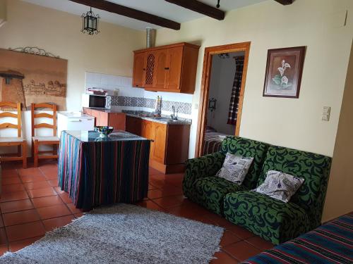 Kuchyň nebo kuchyňský kout v ubytování Apartamentos Turísticos Rural Los Tinaos