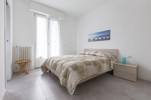 Posteľ alebo postele v izbe v ubytovaní Milano Business Balcony Flat
