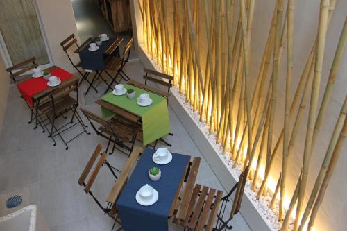 an overhead view of a room with tables and chairs at Bed Nonnonino in Porto Cesareo