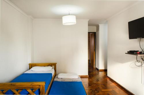 Una cama o camas en una habitación de Apartamento Independencia II