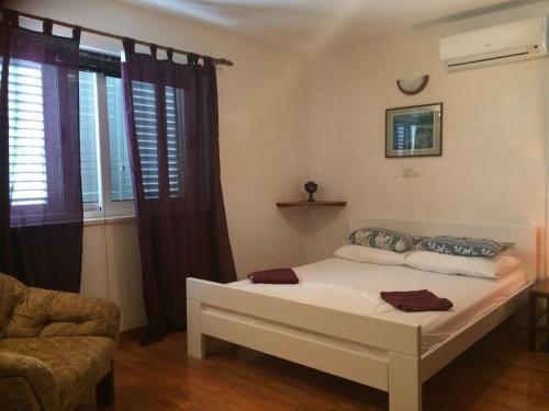 Katil atau katil-katil dalam bilik di Villa Conte