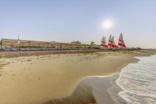 two sailboats on the shore of a beach at Tui Magic Life Jacaranda in Side