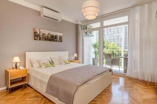 Postel nebo postele na pokoji v ubytování Room Nada