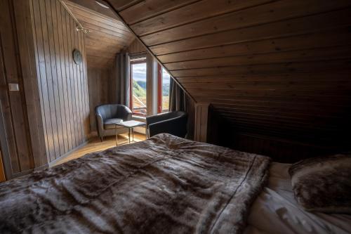 Tempat tidur dalam kamar di Alten Lodge