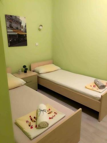 Katil atau katil-katil dalam bilik di MARE Apartmant