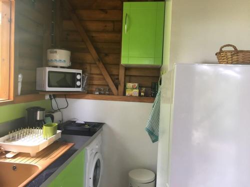 Kuchyň nebo kuchyňský kout v ubytování Le Filao