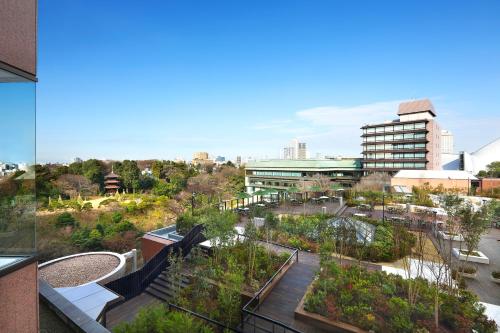 a view of a campus with a building at Hotel Chinzanso Tokyo in Tokyo