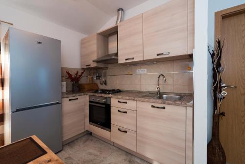 Dapur atau dapur kecil di Apartments Intrada