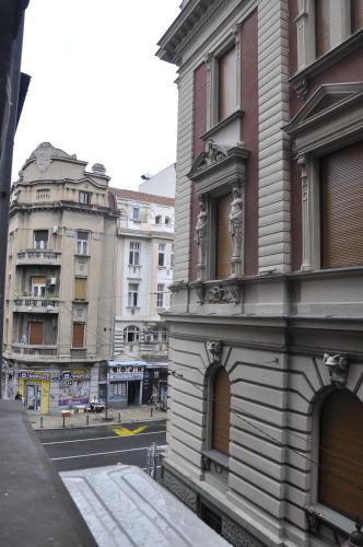 a group of buildings on a city street at Urban Studio in city center in Belgrade