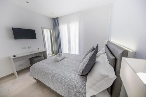 Cama o camas de una habitación en Ossuna Bay Hotel Boutique