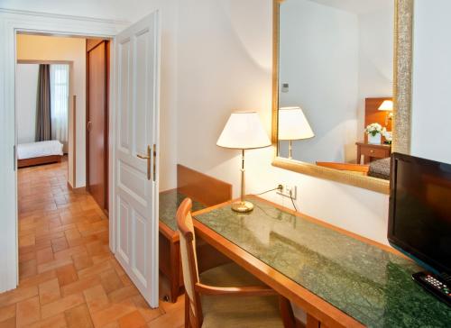 Ett badrum på Hotel Galileo