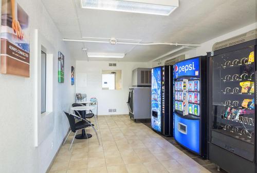 a room with two vending machines in a pharmacy at Motel 6-Pueblo, CO - I-25 in Pueblo