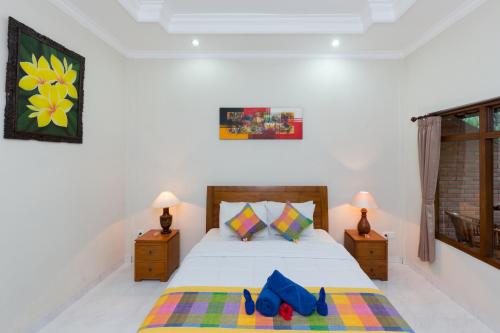 Letto o letti in una camera di Wenara Bali Bungalows