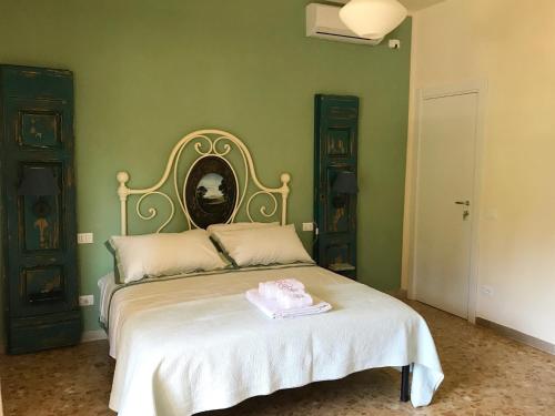 Postel nebo postele na pokoji v ubytování B&B La Casa di Alice