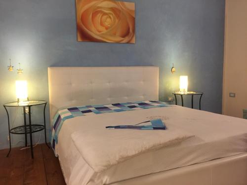 A bed or beds in a room at La Capanna della Nonna