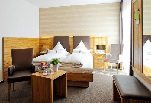 Katil atau katil-katil dalam bilik di Gasthof Hotel Zum Hirsch***S