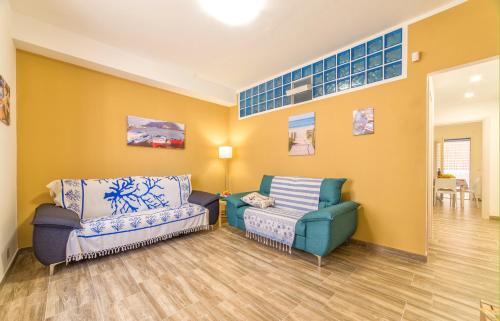 Posezení v ubytování Al Mare