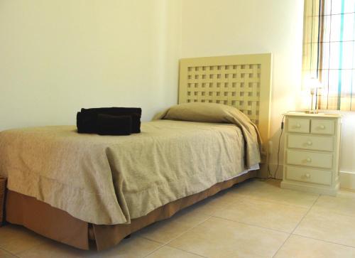 Cama o camas de una habitación en AlmaVerde Village & Spa Resort