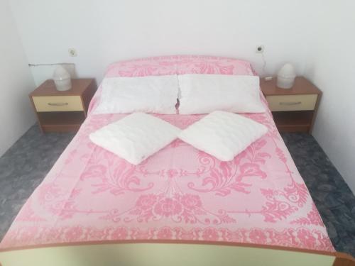 Posteľ alebo postele v izbe v ubytovaní Apartman Aria & Amadea
