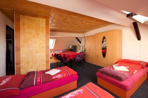Postel nebo postele na pokoji v ubytování Hotel u Nádraží Lanžhot