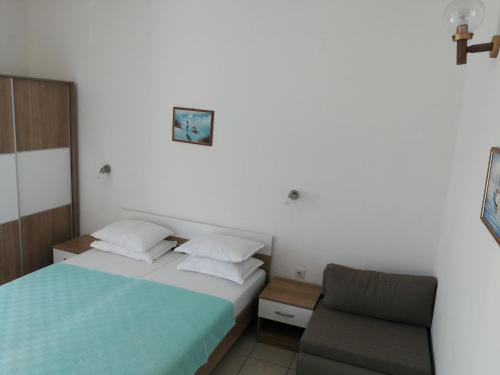 Ein Bett oder Betten in einem Zimmer der Unterkunft Adria Apartments Sara
