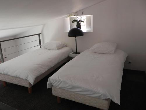 Ліжко або ліжка в номері La Bastide des Vasses