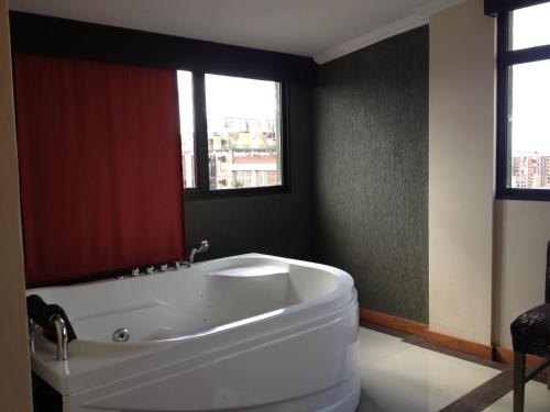 Un baño de Aspen Hotel & Apart