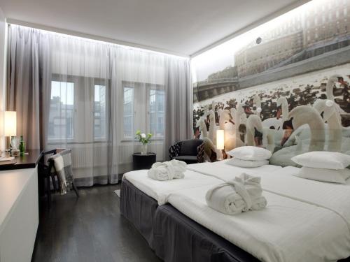 Säng eller sängar i ett rum på Hotel C Stockholm