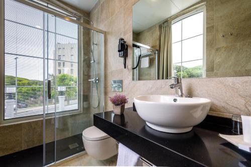 Ένα μπάνιο στο Suite Home Pinares