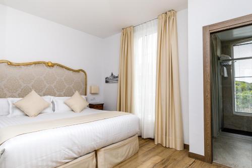 Ένα ή περισσότερα κρεβάτια σε δωμάτιο στο Suite Home Pinares