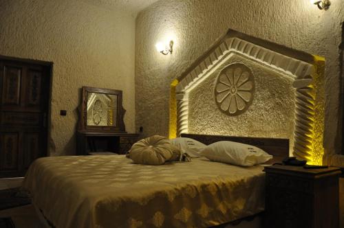 Letto o letti in una camera di Çavuşin Cave House-Cappadocia