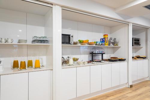 Η κουζίνα ή μικρή κουζίνα στο Suite Home Pinares