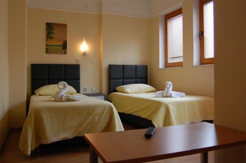 Llit o llits en una habitació de Villa Rimari