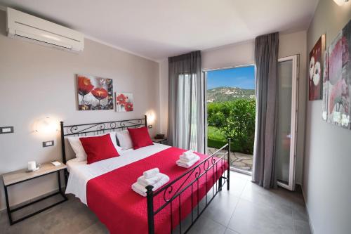 Ένα ή περισσότερα κρεβάτια σε δωμάτιο στο Villas Amantea- four villas with big pool and infinity pool