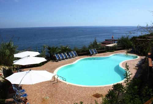 Изглед към басейн в VRclub - Villa Ridente Residence или наблизо