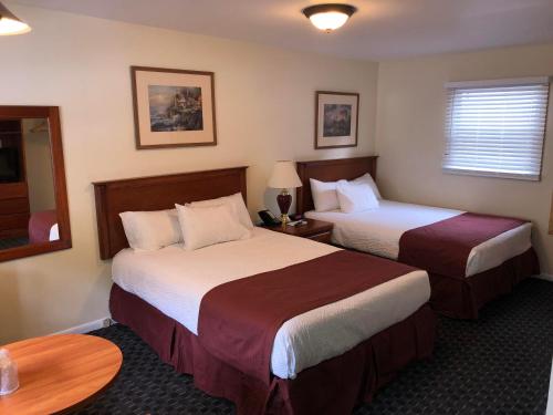 Ένα ή περισσότερα κρεβάτια σε δωμάτιο στο Nordick's Inn