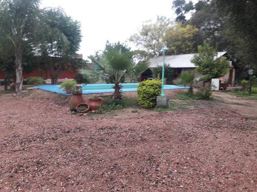 La pileta dentro o cerca de Hotel de Campo El Rebenque