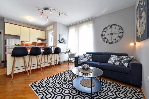 a living room with a couch and a table at Old Clock apartment in Zagreb