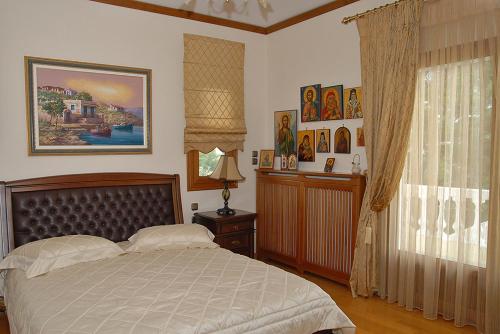 Postel nebo postele na pokoji v ubytování Villa Elegant