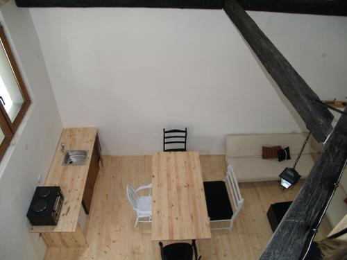an overhead view of a room with a table and chairs at Pannonia Terranova in Vardarac